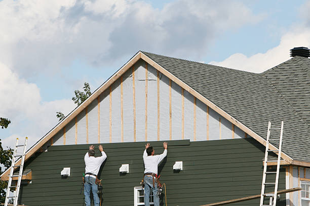 Professional Siding Installation technician working in Blackstone, VA